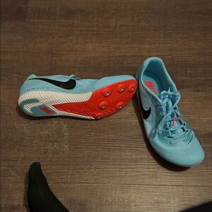 Nike Light Blue and Red Running Spikes